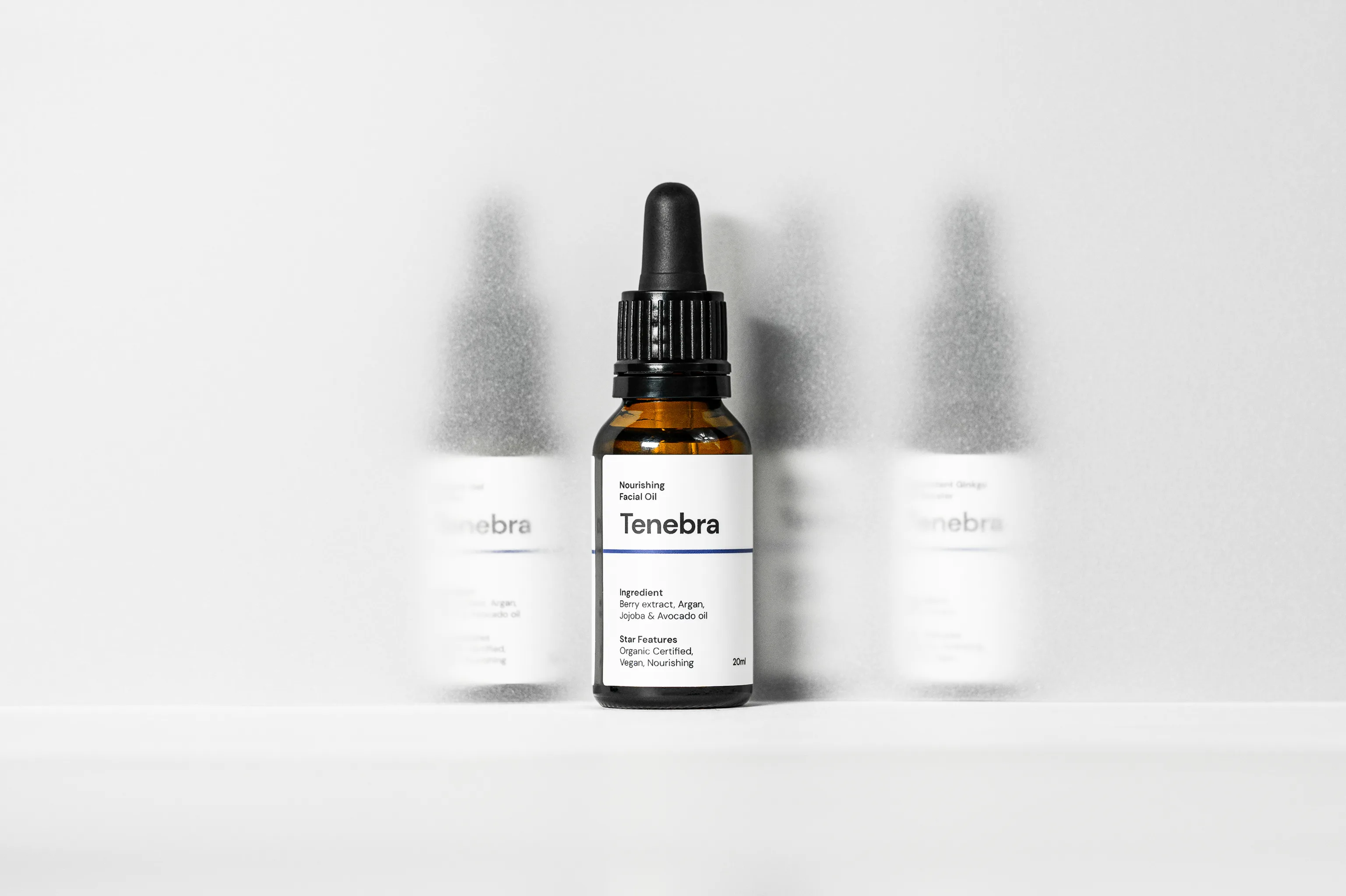 Amber dropper bottle labeled "Tenebra" nourishing facial oil, a Selfnamed private-label clean beauty product